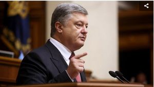 Украина готова работать для отмены виз с Канадой, заявил Порошенко