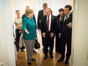 «Путин с отличными картами»: немецкие СМИ о встрече в Париже