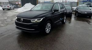 Обзор Volkswagen Tiguan в комплектации Status Plus