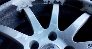 Черная пыль на колесных дисках — причины появления