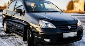Suzuki Liana: Надежный японский седан по цене LADA Granta