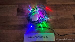 Самодельная новогодняя гирлянда "Колпачки"